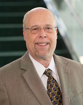Headshot of Melvin Reichman, PhD